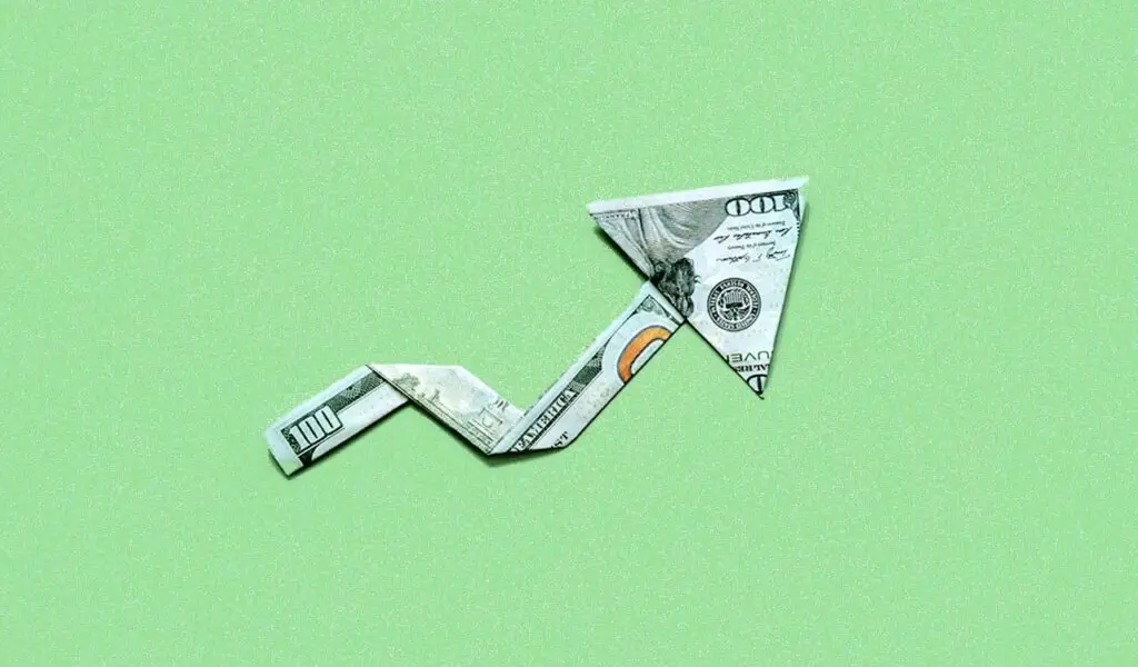 a folded dollar bill arrow