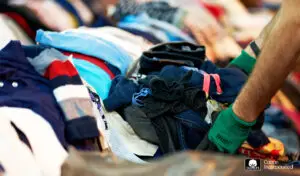 a group of clothes in a store