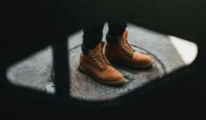 a person wearing brown boots