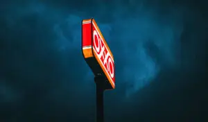 oxxo sign in stormy weather