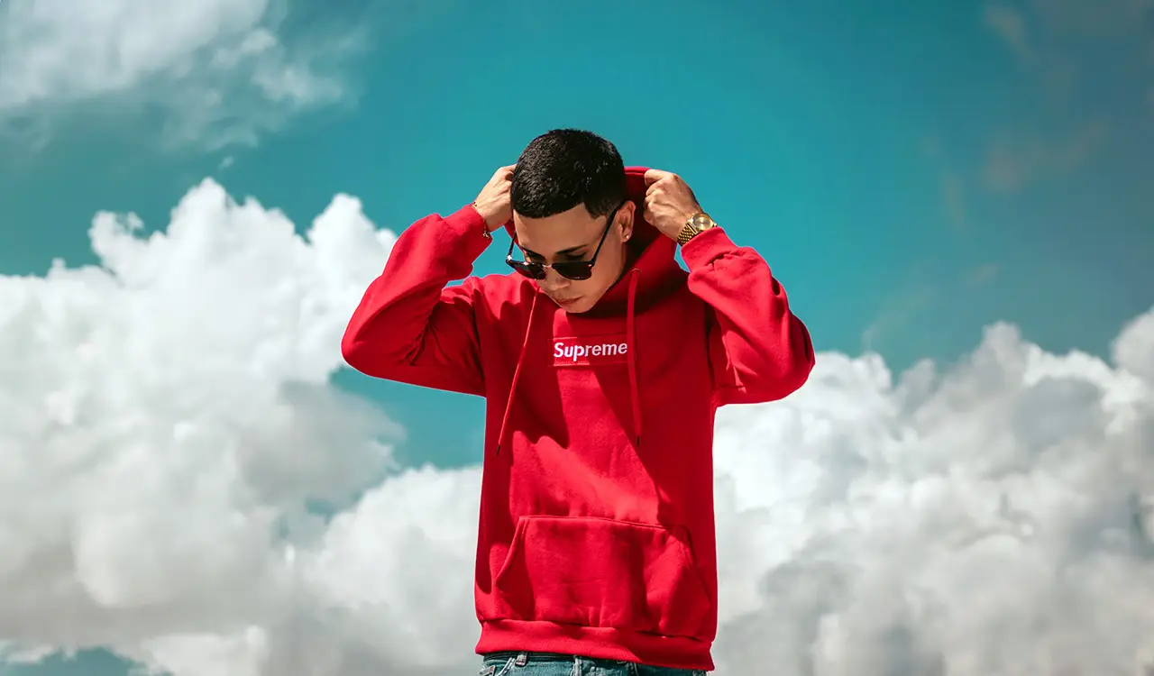 guy in supreme hoodie with sunglasses