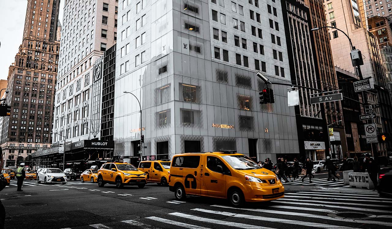 busy street with taxi car