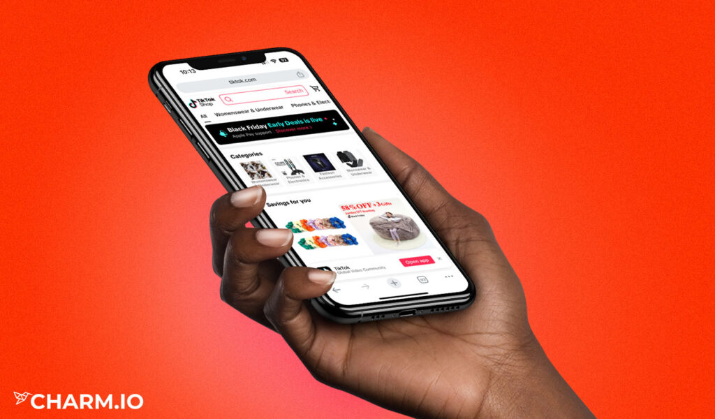 hand holding phone with TikTok Shop app